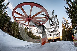 Empty seats at skilift in winter resort