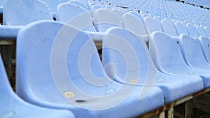 Empty Seats In Stadium. Blue Plastic Seats In Stadium Without Spectators