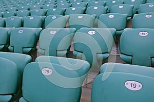 Empty seats in the stadium due to coronavirus. Banning sporting events due to lockdown. Distribution of Covid-19