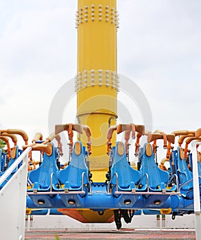 Empty seats of a thrilling ride at amusement park