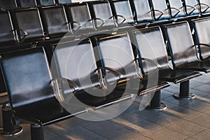 Empty seats in waiting lounge on airport