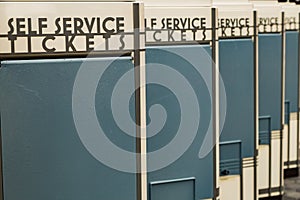 Empty self service ticket machines in a row
