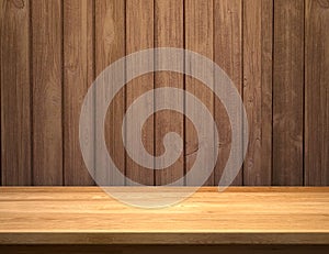 Empty shelf on wooden plank wall