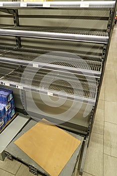 Empty shelves in a supermarket because of Covid-19 panic shopping