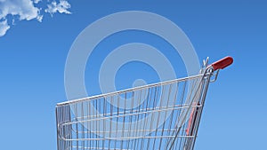 Empty shopping cart and blue sky