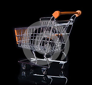 Empty Shopping Cart isolated in black