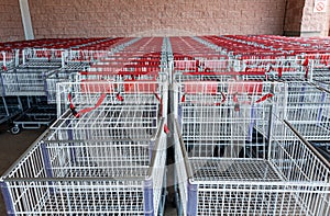 Empty shopping carts outside supermarket