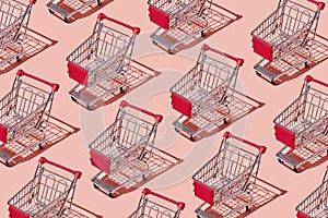 Empty Shopping Carts On Pink Background