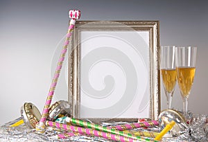 Empty Silver Frame Still Life for New Year's Eve with Champagne