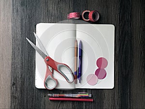 Blank notebook and art supplies photo