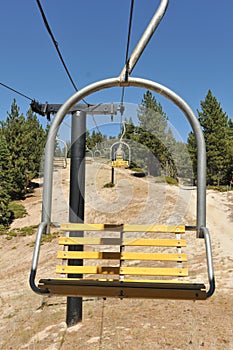 Empty ski lift chairs in a row