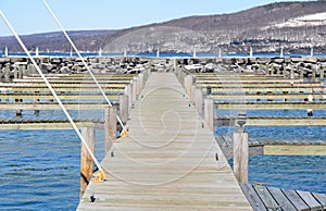 Empty slips late winter Seneca Lake showing straight dockboards