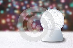 Empty Snow Globe on a Christmas Blurry Background