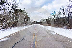 Empty Snow Lined Road in Suburban Chicago