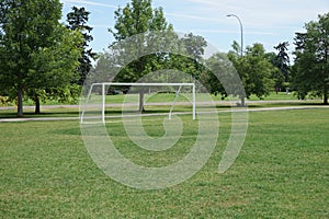 Empty soccer net in park