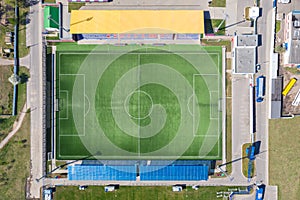 Empty soccer stadium green field. aerial top view