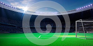 Empty soccer stadium in sunlight