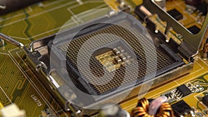 Empty socket for the central processor on the motherboard. The processing system of the central processes of the PC. A