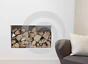 Empty Sofa with fire place behind