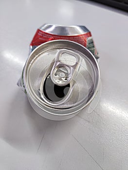 Empty sofdrink can after crushed
