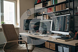 Empty software developer office with multiple screens