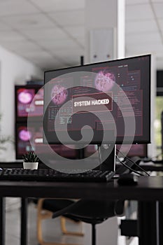 Empty software office displaying critical error message flashing on pc display
