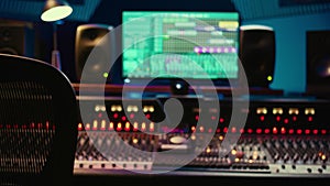 Empty soundproof control room in professional recording studio