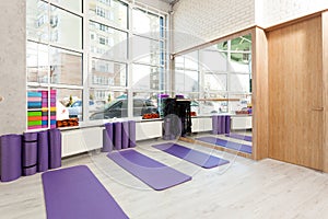 Empty space in fitness center, yoga mats