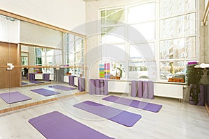 Empty space in fitness center, yoga mats