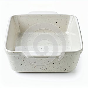 Empty speckled square ceramic baking dish for culinary creations on white background