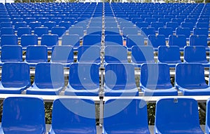 Empty spectator seats in the open-air arena