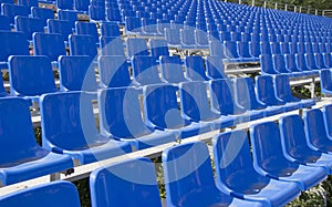 Empty spectator seats in the open-air arena