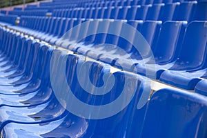 Empty spectator seats in the open-air arena