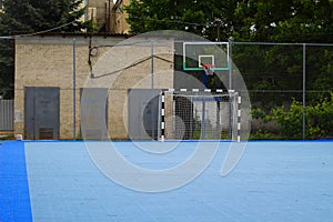 Empty sports ground for soccer and basketball