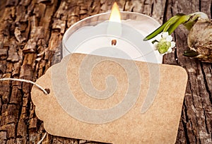 Empty spring sign with white candle