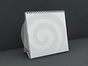 Empty square desk calendar on table. Mockup design concept. 3D