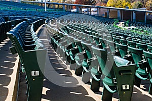 Empty stadium seating in large amphitheater