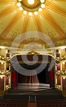 A empty stage of an old theater