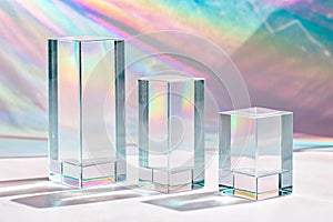 Empty stage with three clear glass rectangle prism podiums photo