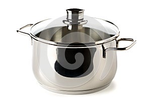 Empty stainless steel cooking pot with glass lid over white background, cooking or kitchen utensil