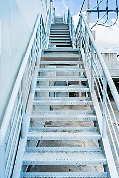 Empty stairs.Steel stair for fire exit door in factory