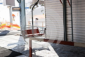 Empty station of ski lift with chairs in a ski-resort