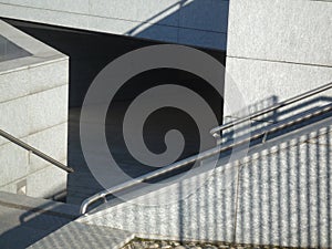empty stone stairs in a modern city building in morning light
