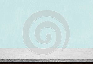 Empty stone table top on blue concrete background