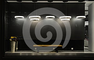 Empty store window with led light bulbs,LED lamp used in shop window,Commercial decoration,black grey background