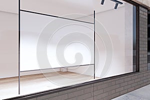 Empty storefront window with mock up poster for your advertisement. Display, boutique and retail concept. 3D Rendering