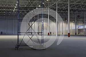 Empty Storehouse With Scaffold photo