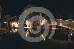 empty street along water channel in Venice