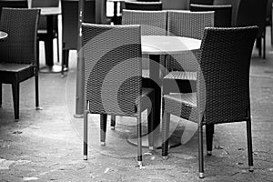 empty street cafe with chairs