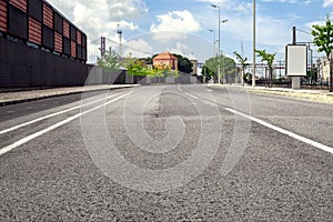 Empty street road in city with sky photo